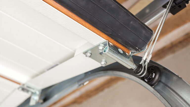 how to adjust garage door springs yourself
